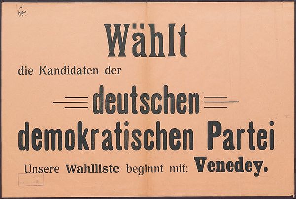 Auf bräunlichem Papier in schwarzer gedruckter Schrift die Worte: Wählt die Kandidaten der deutschen demokratischen Partei. Unsere Wahlliste beginnt mit: Venedey. Oben links handschriftlich: 60.